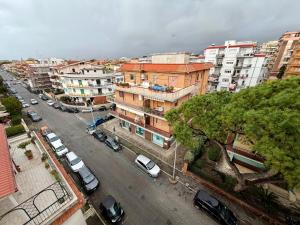 an aerial view of a city with cars parked at Italy House in Ladispoli