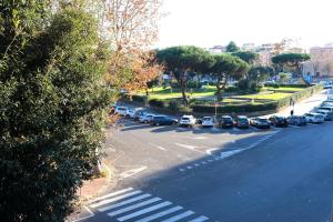 an aerial view of a parking lot with cars at Metro&Mare House in Lido di Ostia
