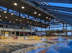 a large building with a fountain in the middle of it at Modern Bright Suite Self Check-In in North Vancouver