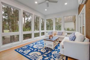 a living room with a couch and a table at Baywood 3074 in Seabrook Island