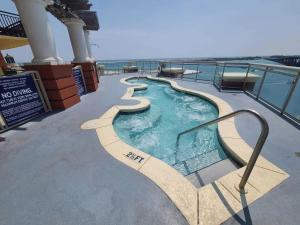 a swimming pool on the top of a cruise ship at Where the Harbor Wakes For 6 in Destin