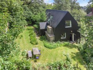 an aerial view of a black house with a yard at Croft Lodge Studio in Leominster