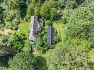 an overhead view of a house in the forest at Croft Lodge Studio in Leominster