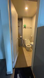 a bathroom with a toilet and a sink at Aisyah Studio D perdana in Kota Bharu