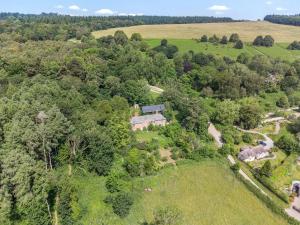 an aerial view of a house in the forest at Croft Lodge Studio in Leominster