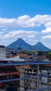 a view of a city with mountains in the background at BB Hotel in Gerik