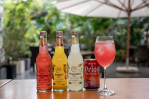 a group of bottles and a drink on a table at kānusuba zamami in Zamami +26 photos