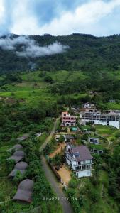 an aerial view of a village on a hill at Tranquil Edge Villa in Haputale