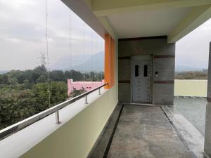 a view from the balcony of a building at Amaravathi Residency in Nārāyanavanam