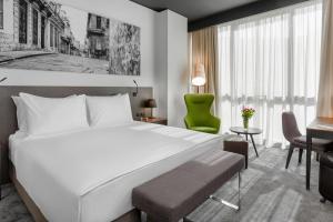 Voodi või voodid majutusasutuse Crowne Plaza Podgorica by IHG toas