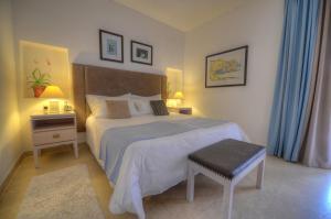 Säng eller sängar i ett rum på Hotel Ta' Cenc & Spa