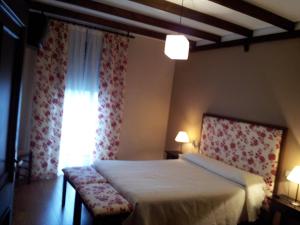 Posteľ alebo postele v izbe v ubytovaní Apartamentos El Mirador Del Soto