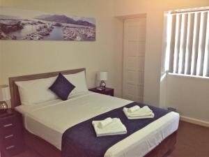 Postel nebo postele na pokoji v ubytování Lees Hotel