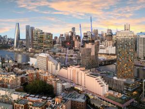 an aerial view of a large city with buildings at Novotel Sydney Darling Harbour in Sydney