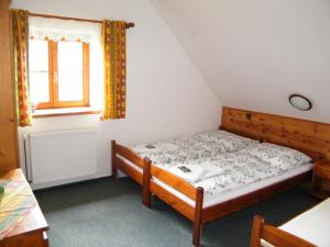 Postel nebo postele na pokoji v ubytování Chalupa u Smrčiny
