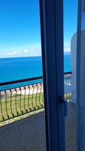 a view of the ocean from a balcony at B&B Don Orlando in Pizzo