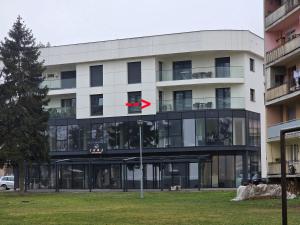a building with a red mark on the side of it at Apartment Real in Bugojno