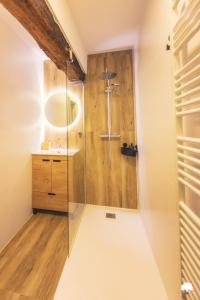 a bathroom with a shower and a sink at Albergue La Incera in San Martín +152 photos