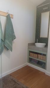a bathroom with a sink and a mirror at Riverfront Guesthouse ,Watermeadows farm in Sedgefield +45 photos