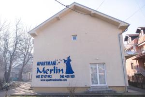a building with a sign on the side of it at Studio Merlin 2 in Soko Banja
