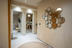 a room with a bunch of mirrors on the wall at Bosi Suites 2 in Zakynthos