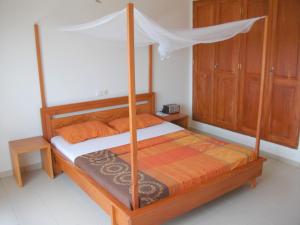 Postel nebo postele na pokoji v ubytování Dodoo Lodge