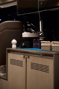 a counter in an office with a counter top at MYTH bay in Bandar Jişşah +23 photos