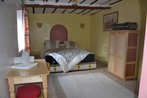 Postel nebo postele na pokoji v ubytování Ksar Timnay Hotel + 33 fotografií