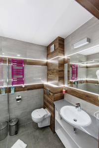 Koupelna v ubytování Hotel Oskar Business & Spa