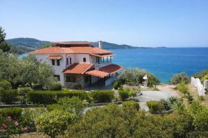 a house with a view of the ocean at Blue Dandelion in Paliouri