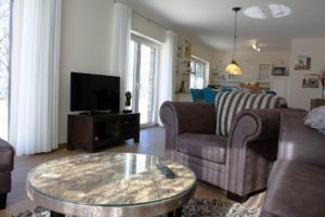 a living room with a couch and a coffee table at Peter in Lenz