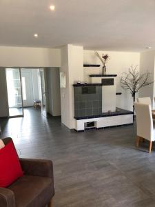 a living room with a couch and a table at Michael in Lenz