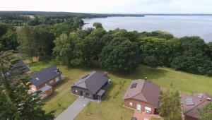 an aerial view of a house with a lake at Valentina in Lenz