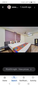 a picture of a bedroom with a bed in a room at AB Merridien in Coimbatore