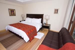 Postel nebo postele na pokoji v ubytování Hotel Medina Del Lago
