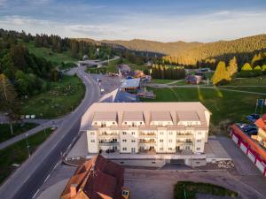an aerial view of a building and a road at Apartment 117 in Feldberg