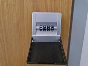 a close up of an electronic device on a door at Haltijanmetsä in Kotka