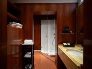 a bathroom with a sink and a shower at Santa Maria Foris in Ravenna +88 photos