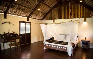 Koyao Bay Pavilions - Beach Resort and Pool Villas客房内的一张或多张床位