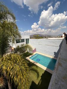 a swimming pool in the middle of the water at 20 minutes from Chapala, Pool &Grill in Buenavista