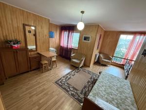 an overhead view of a living room with a table and chairs at Hotel palas tatariv in Tatariv