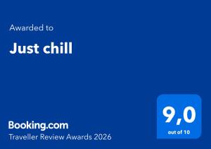 a blue sign with the words just chill on it at Just chill in Riga