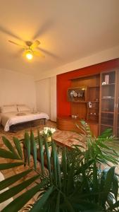 a bedroom with a bed and a ceiling fan at Appartamento "In viaggio come a casa" vicino alla Stazione, LTScalo! in Monticchio