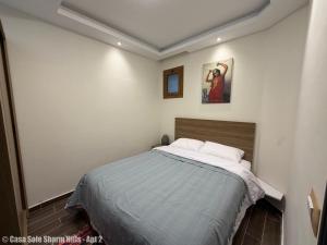 a bedroom with a large bed in a room at Casa Sole Sharm Hills Apt 2 in Sharm El Sheikh