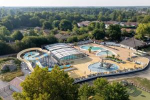 an aerial view of a water park at Mobilhome camping Rivage des Landes in Aureilhan +11 photos