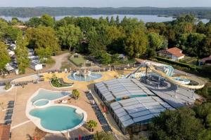 an aerial view of a water park with a roller coaster at Mobilhome camping Rivage des Landes in Aureilhan