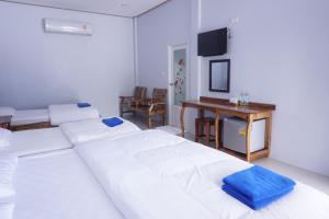Postel nebo postele na pokoji v ubytování Anyamanee Resort Trat