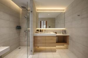 a bathroom with a sink and a shower at Bhumidol Home near Don Muang Airport in Lak Si +66 photos