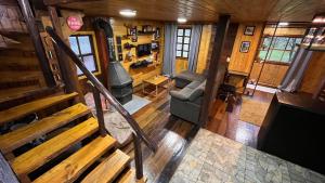 an overhead view of the living room of a tiny house at Morada das Estrelas in Cambará