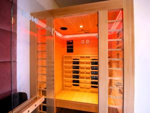 a display case of a wine cabinet in a store at Cristalys Loveroom & Spa in Montpellier